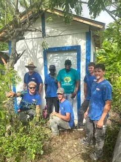 Volunteers helping with community rebuilding